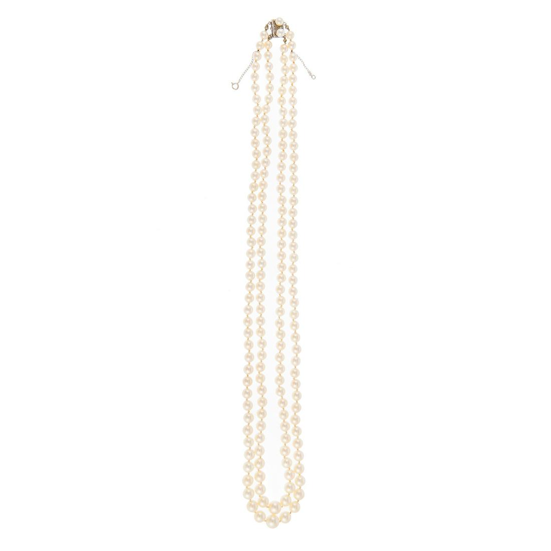 A Double-Strand Cultured Pearl Necklace: Double strand of cultured pearls in nesting graduated style, pearls range in size from 5.0 mm to 8.5 mm in front with 14K white gold box clasp, 22 in. L, 56.2 grams