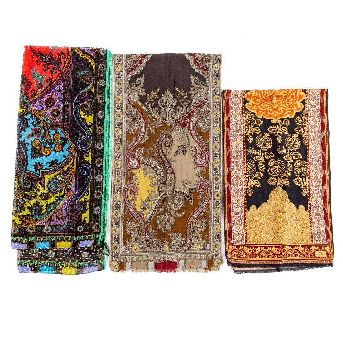 Three Etro Silk, Wool & Cashmere Scarves: 1) A green and multicolor Etro silk, wool and cashmere scarf with paisley motif, fringe and hand rolled edges. Measuring: 64 in. L, 16 in. H, 2) A black and multicolor Etro silk and wool scarf with pa