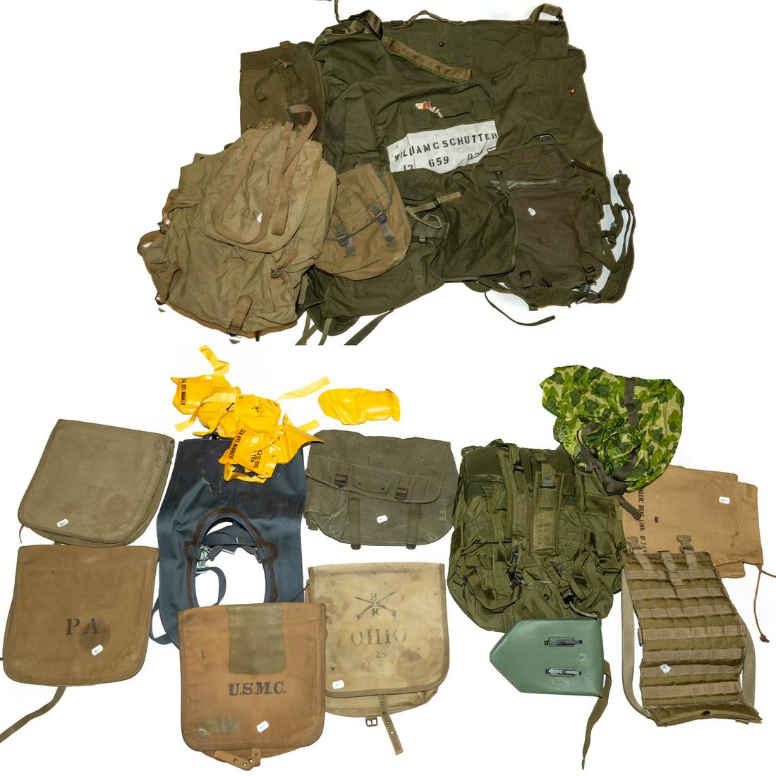 Group of Military Items: Including backpacks and other canvas bags, survival dye packs, inflatable life vest, and other similar items.