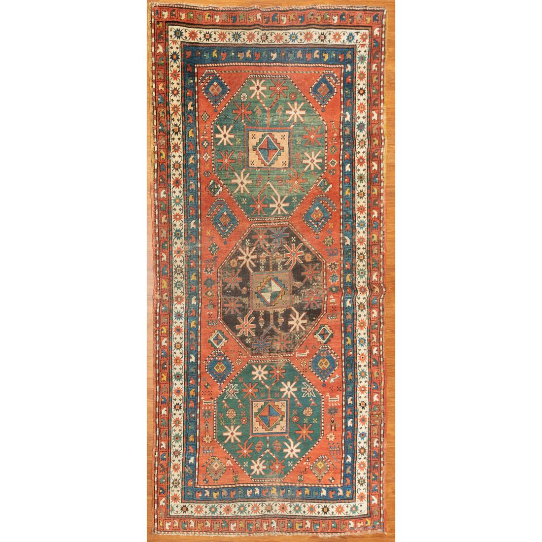 Semi-Antique Caucasian Rug, 3.11 x 8.2: Second quarter-20th century; hand-knotted, wool pile.