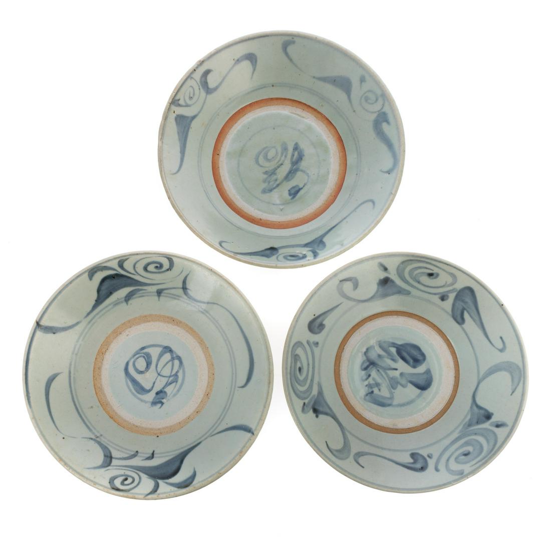 Three Chinese Export Swatow Dishes: Ming Dynasty, Chongzhen Era, circa, 1630-40 green celadon glaze with underglaze cobalt geometric decoration. 11 in. Diam.