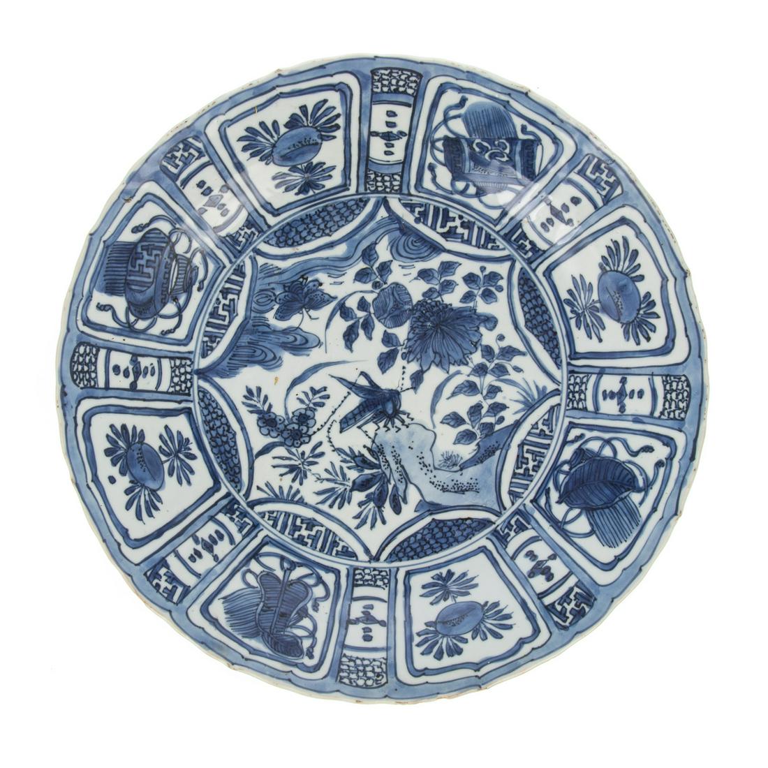 Chinese Export Kraak Charger: Ming Dynasty, Wanli Era, circa 1580-1600 center with cricket and plants on water's edge, border with alternating floral medallions on interior and exterior. 12 1/2 in. Diam.