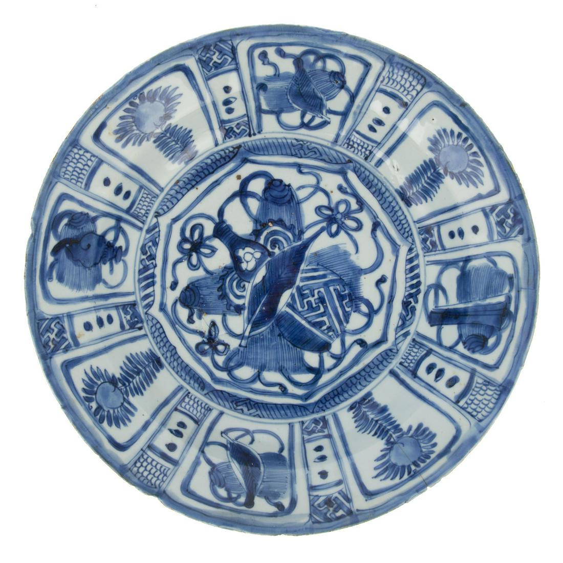 Chinese Export Kraak Bowl: Ming Dynasty, Wanli Era, circa 1580-1600 center with sacred objects and border with alternating floral medallions and sacred objects on interior and exterior. 12 in. Diam.