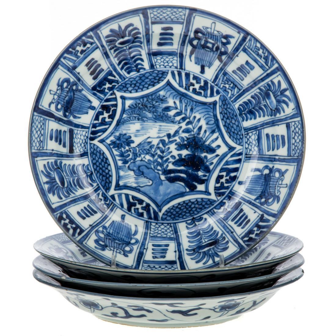 Four Chinese Export Kraak Bowls: Ming Dynasty, Chongzhen Era, circa 1630 center with cricket in garden and border with alternating floral medallions and sacred objects on interior and exterior. Underglaze character mark underneath 8