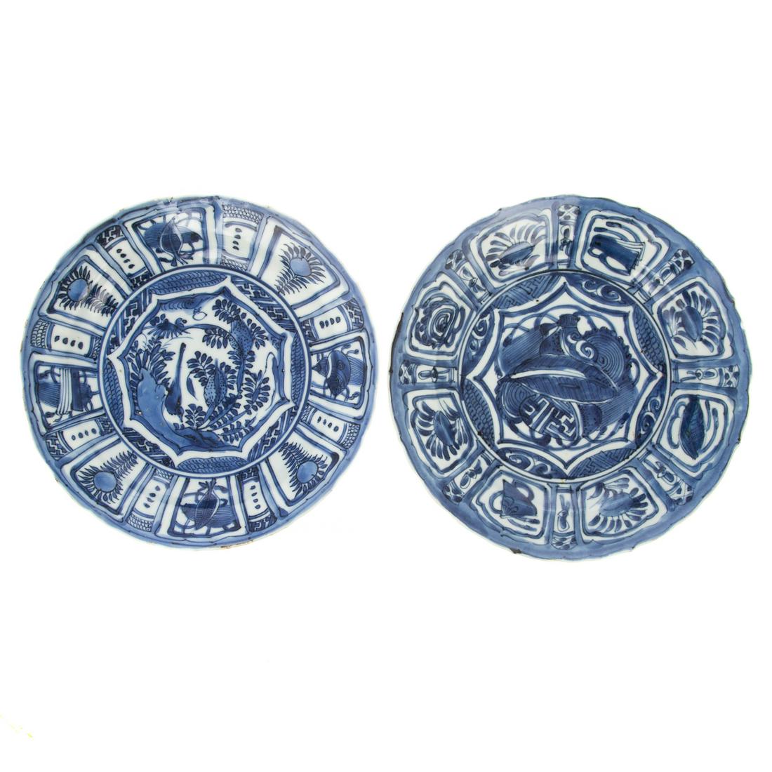 Two Chinese Export Kraak Bowls: Ming Dynasty, Chongzhen Era, circa 1630-40 center with decoration of bird in garden, and border with floral and sacred object alternating vignettes. 8 in. Diam. center with sacred objects and border w