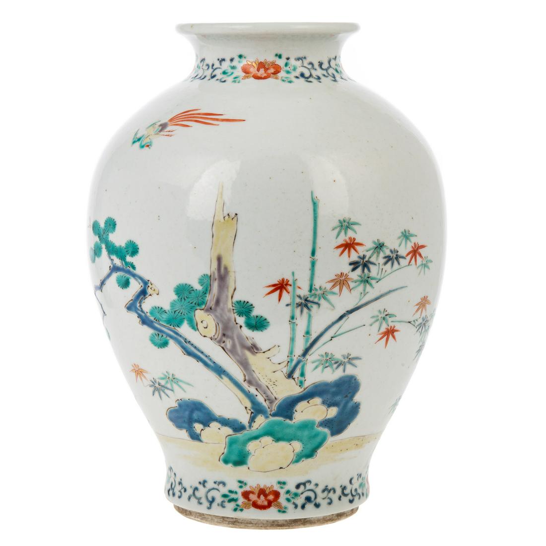 Chinese Kakiemon Porcelain Vase: Yongzheng Era, circa 1730-40 decoration of scholar's stone, bamboo and fallen tree , with bird flying above. 10 in. H.