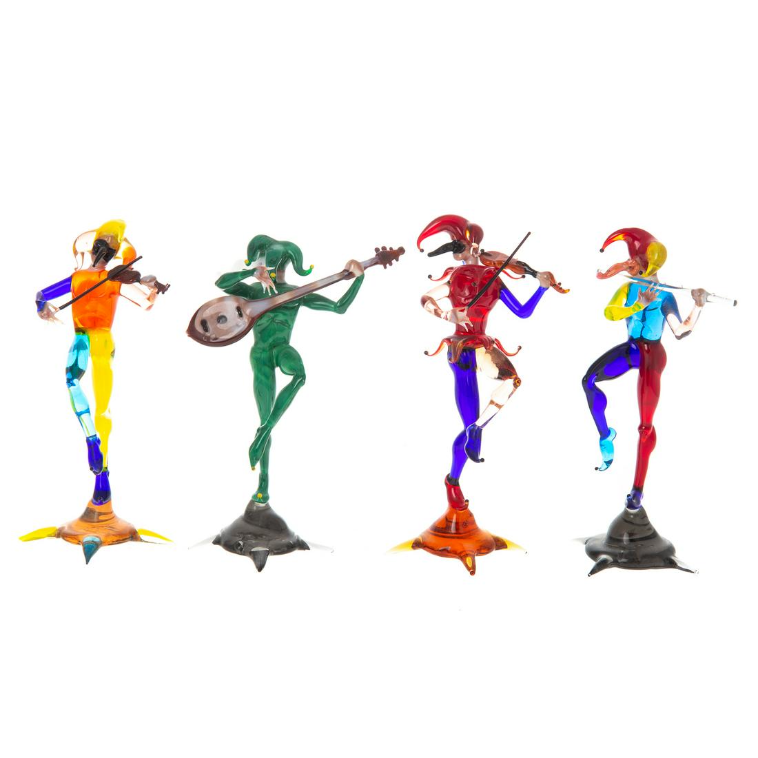 Lucio Bubacco. Four Glass Carnival Musicians: (Italian, b. 1957). Four musicians dressed in fantastic and colorful carnival costumes, includes two violinists, lute player and flute player, each on compass point base, all approximately, 5 in. H.