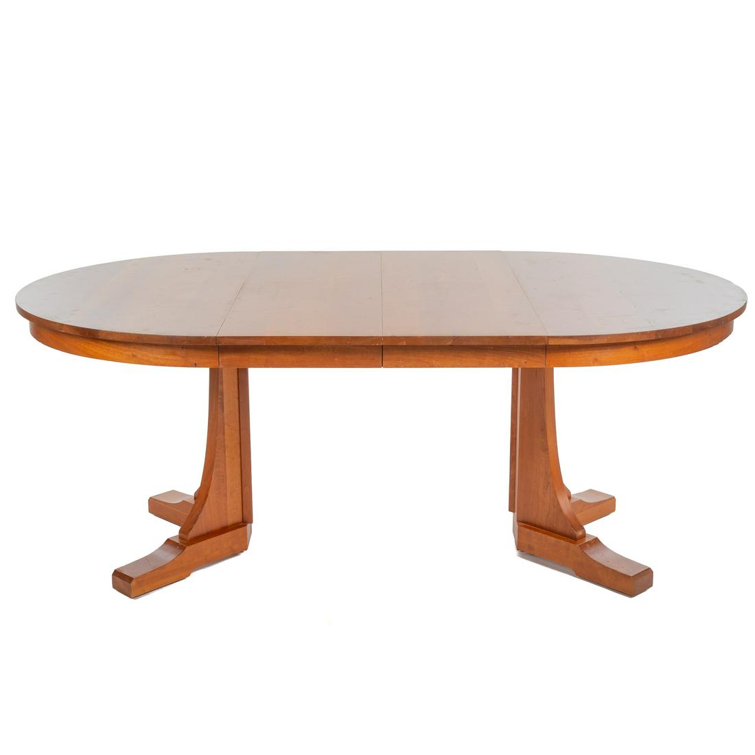 L.& J.G. Stickley Round Pedestal Dining Table: Circa 2004; Stickley Mission style cherry dining table, on single pedestal base, 30 in. H., 46 in. Diam., having two 15 in. table leaves. Table marked underneath.