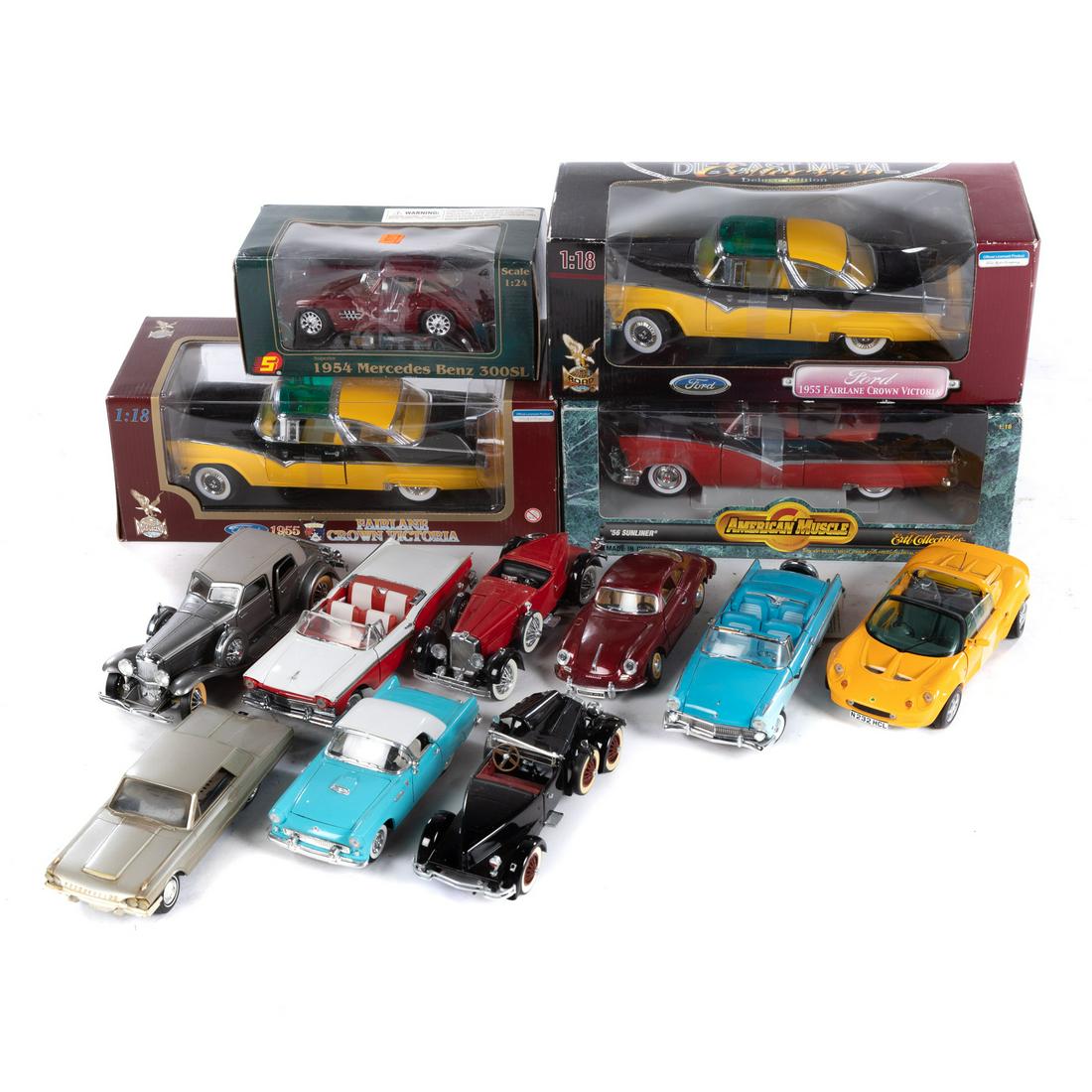 10 Assorted Die-Cast Cars: Includes classic and antique cars, some in boxes.