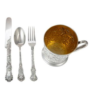 Victorian Silver Presentation Travel Set: Francis Higgins II, London, 1869, retailed by Hunt & Roskell, New Bond Street, London. In the original fitted case, comprising cup and cutlery set in scrolling grapevine decoration, the cup is monogra