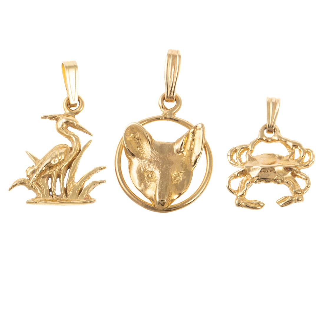 A Collection of Three Pendants/Charms in 14K (1 of 7)