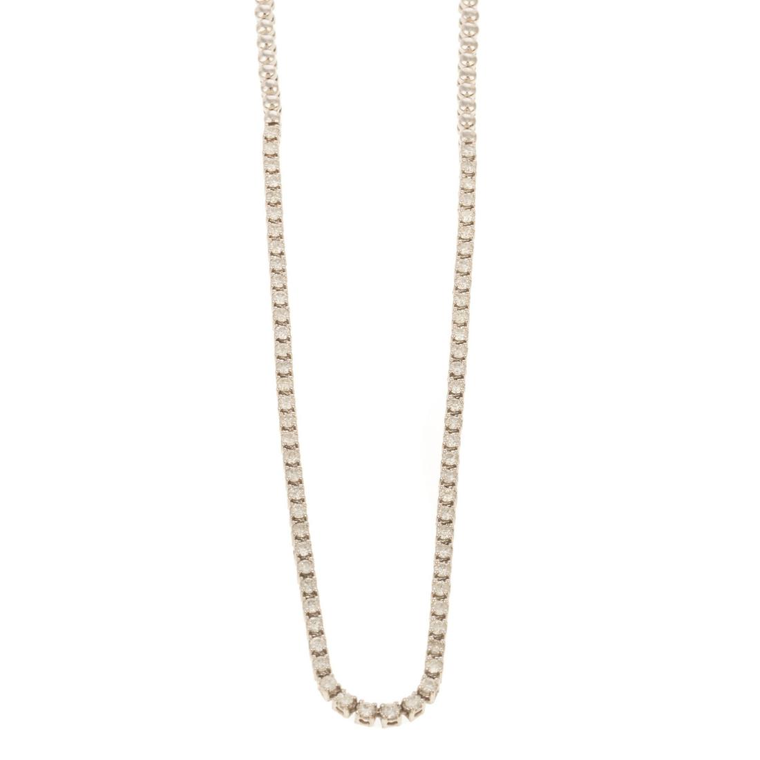 A 3.25ct Diamond Necklace in 14K: 14K white gold necklace with round diamonds weighing approx. 3.25 ctw prong set through the front half of necklace with high polish links on the back half of necklace, box clasp with snap under safety