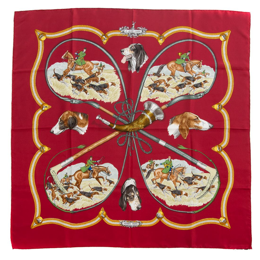 An Hermes "Le Laisser Courre" Scarf 90: Red and multicolor Hermes 90 cm silk scarf with "Le Laisser Courre" motif and hand rolled edges. Designed by Jean De Fougerolle