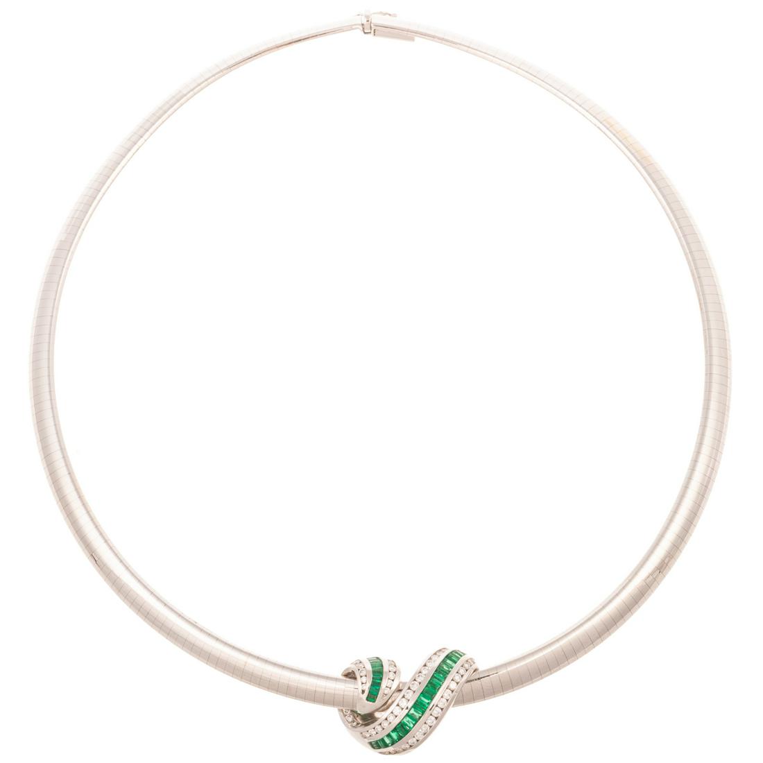 A Krypell Diamond & Emerald Slide & Omega Necklace: 18K white gold diamond and emerald ribbon slide by Charles Krypell, featuring channel set very fine emerald baguettes weighing approx. 1.50 ctw, and round diamonds weighing approx. 1.00 ctw, on a 18K