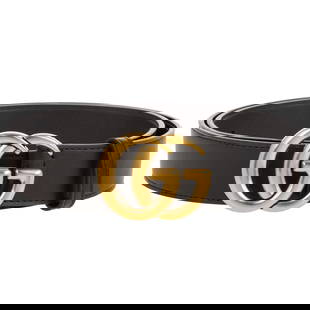 A Gucci Black Leather Belt: A black leather Gucci belt with gold tone GG buckle, approx. 44 in. L