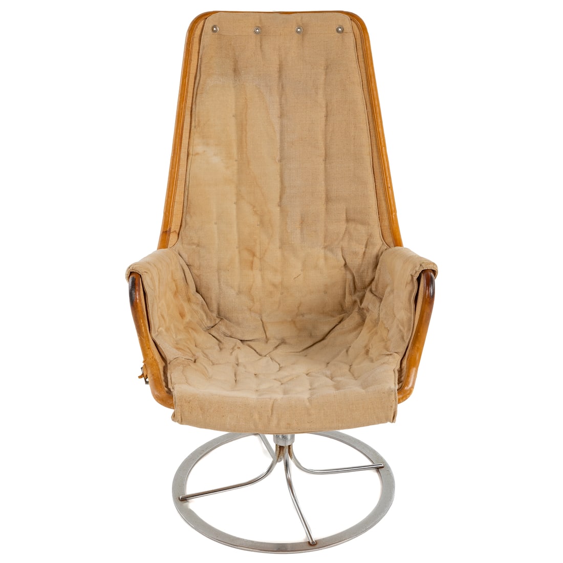 Bruno Mathsson for Dux "Jetson" Armchair: 20th century; chrome swivel chair with sewn leather trim and beige quilted fabric upholstery, 39 in. H., 24 in. W., 19 in. D. From the Philip and Lois Macht Estates, Baltimore, MD.