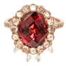 A Garnet & Diamond Dangle Ring in 14K