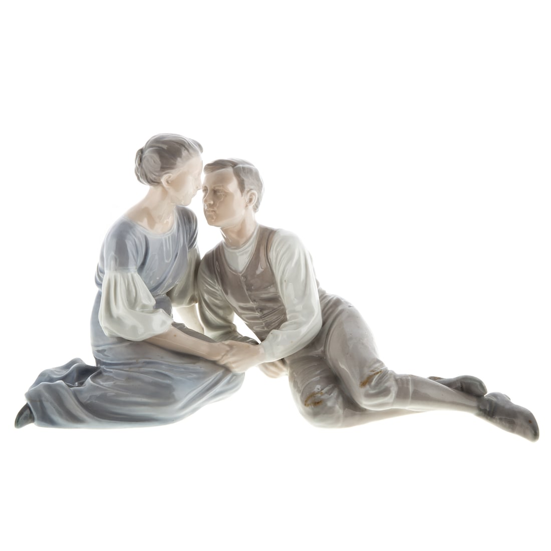 Bing & Grondahl Porcelain Teenage Lovers: #1680, 7 in. H., 12 in. L. For further reading see "Royal Copenhagen Porcelain" p.64, by Caroline & Nick Pope. Provenance: From the Lawrence E. Rubin Collection.