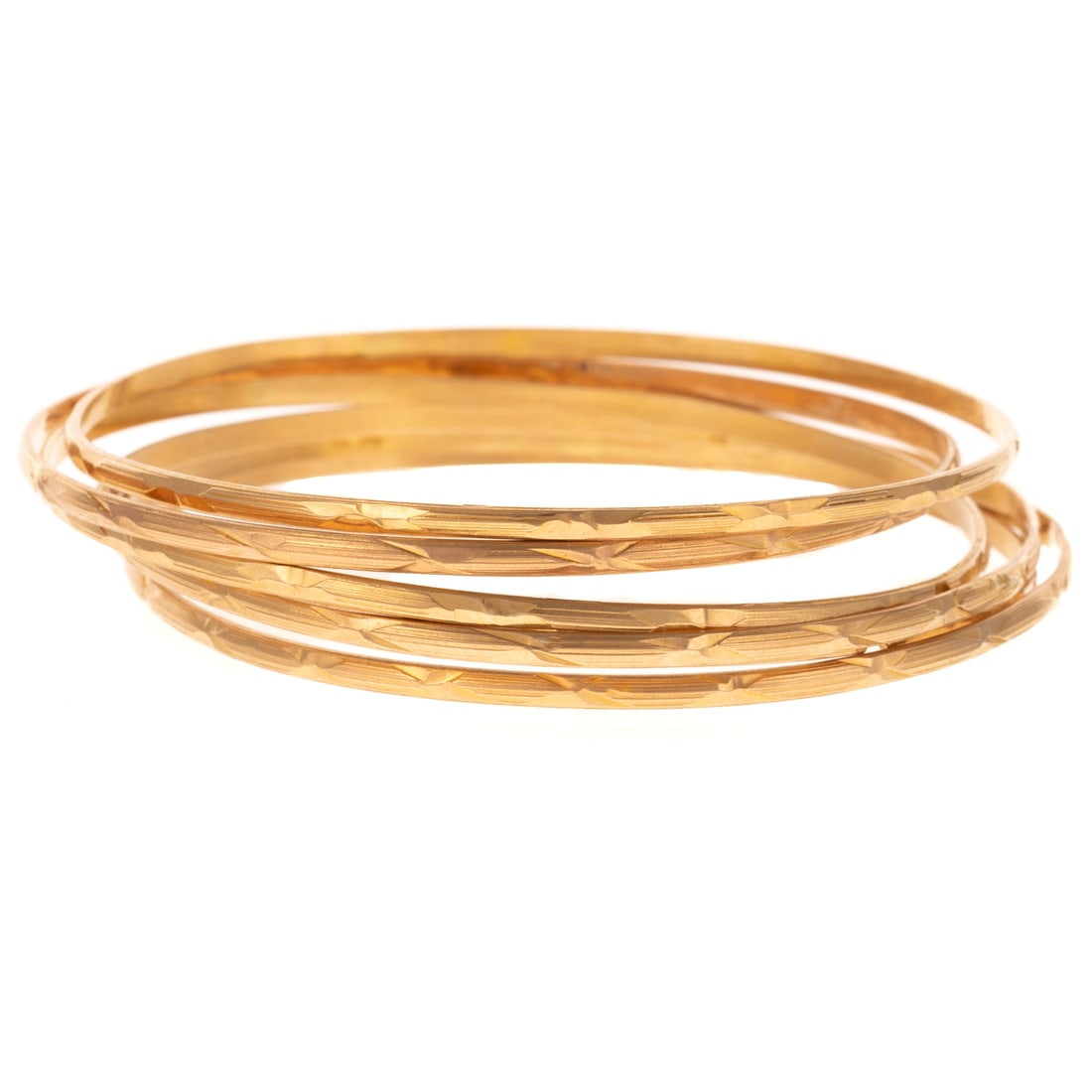 A Group of Six Gold Bangles in 18K (1 of 4)