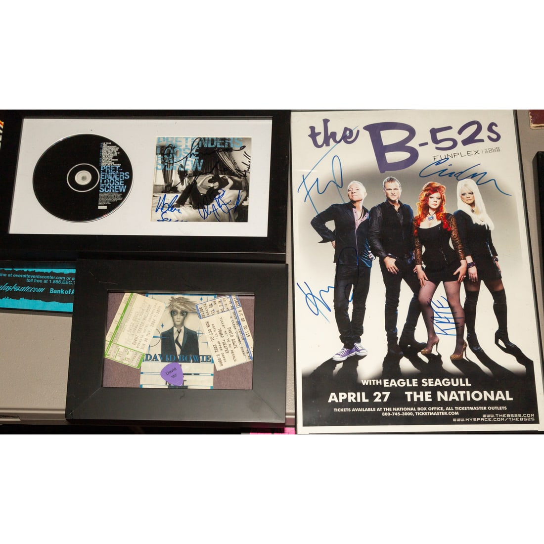 B-52's, David Bowie, & Pretenders: Memorabilia: Comprising a B-52's Funplex Tour 2008 signed concert poster, framed size: 11 x 17 in.; a Pretenders "Loose Screw" framed and signed CD; and a David Bowie framed backstage and limo pass, includes a Dav
