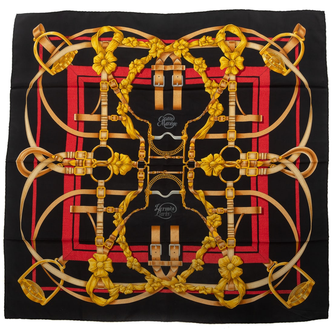 An Hermes "Grand Manege" Scarf 90: A black and gold Hermes 90 cm silk scarf with "Grand Manege" motif and hand rolled edges Provenance: From the Estate of Susan Koenig Luckan, Fallston, MD