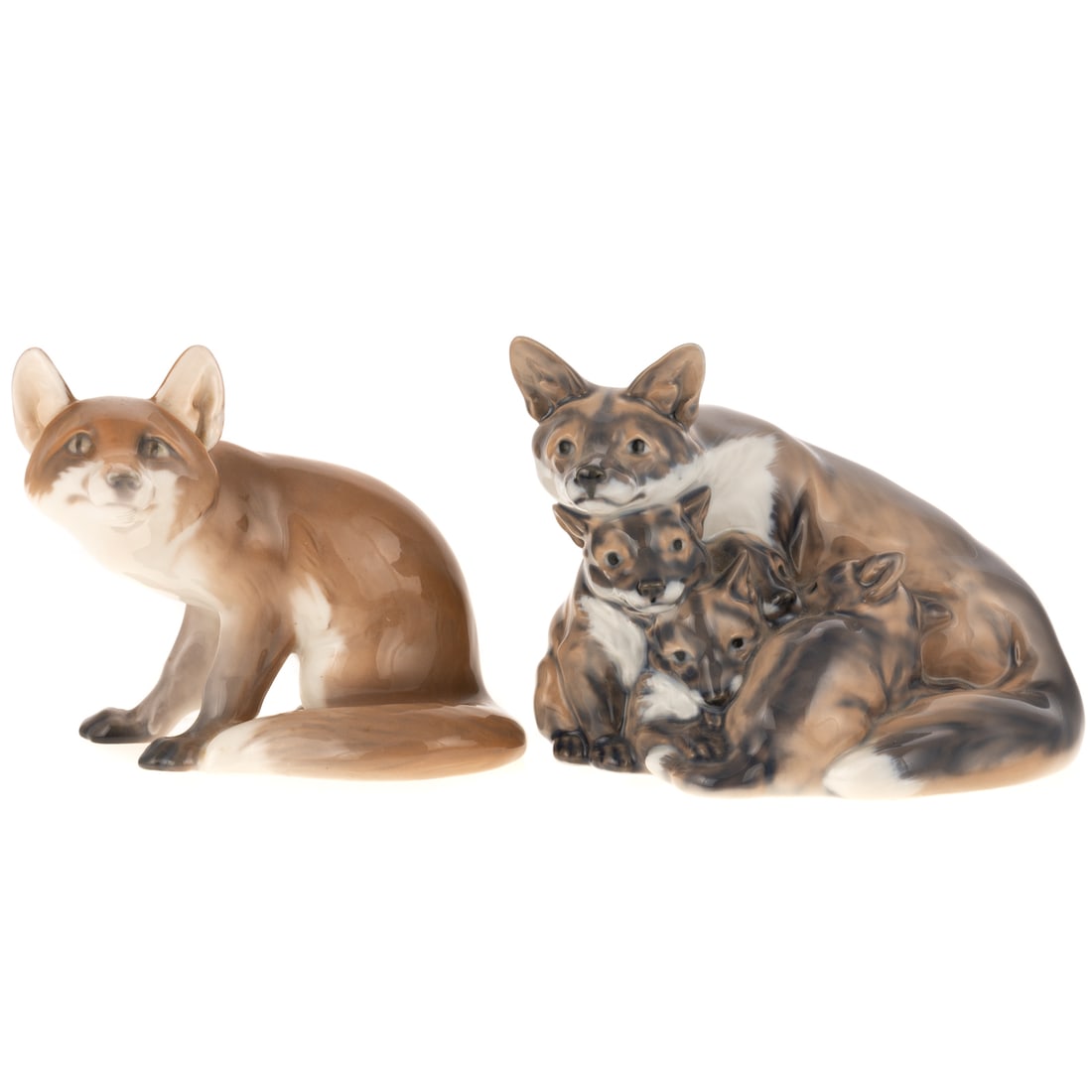 B & G Fox Sitting, Dahl-Jensen Vixen with Cubs: 20th century, B & G fox sitting, #1905, and Royal Copenhagen vixen with cubs 1916, #1788, by Heter Herold, 4 and 4 1/2 in. H, For further reading see "Bing & Grondahl Porcelain" p.100, by Caroline and