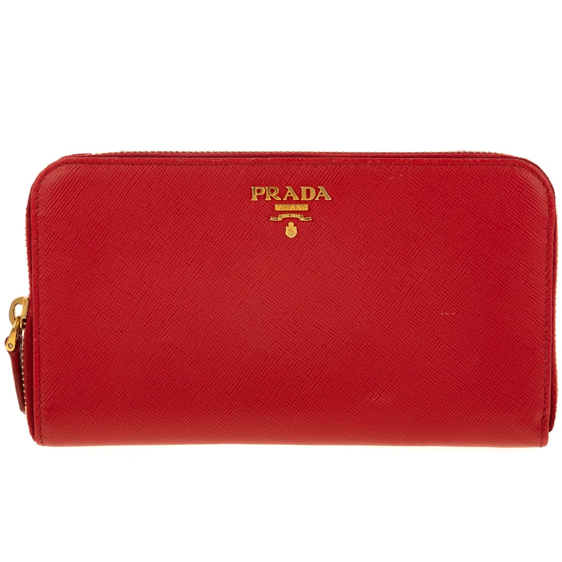 A Prada Zip Around Wallet: A red Saffiano leather Prada Zip Around Wallet with gold tone hardware, and logo at front. Red leather lining with two interior compartments, including single zip section, two interior bill compartmen