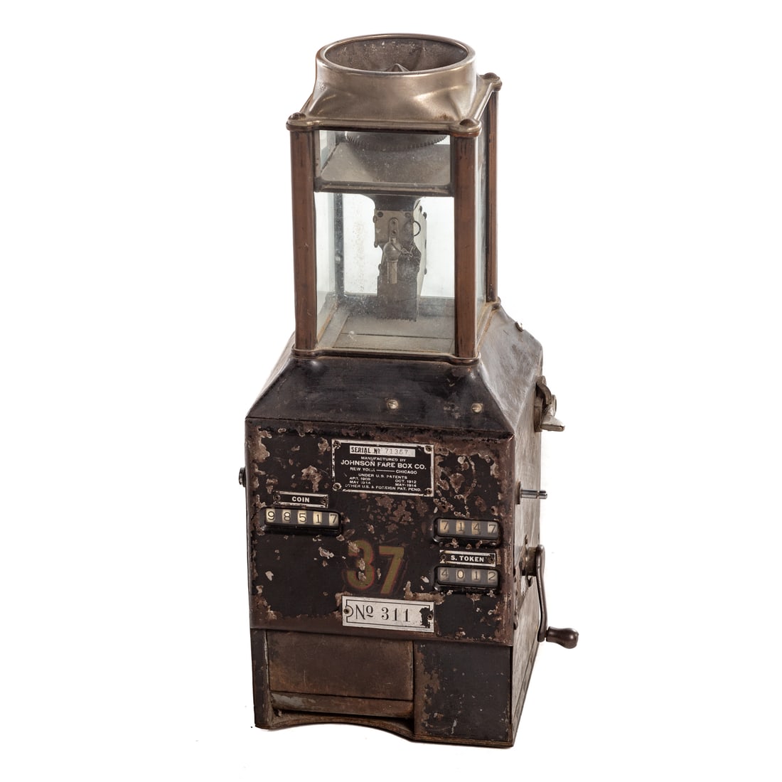 Johnson Fare Box Co. Fare Box: First quarter, 20th century, metal and glass fare collection box for buses and trolleys, with 'Johnson Fare Box Co." manufacturer plate, serial # 71357, 19 1/2 in. H, 7 in. Sq.