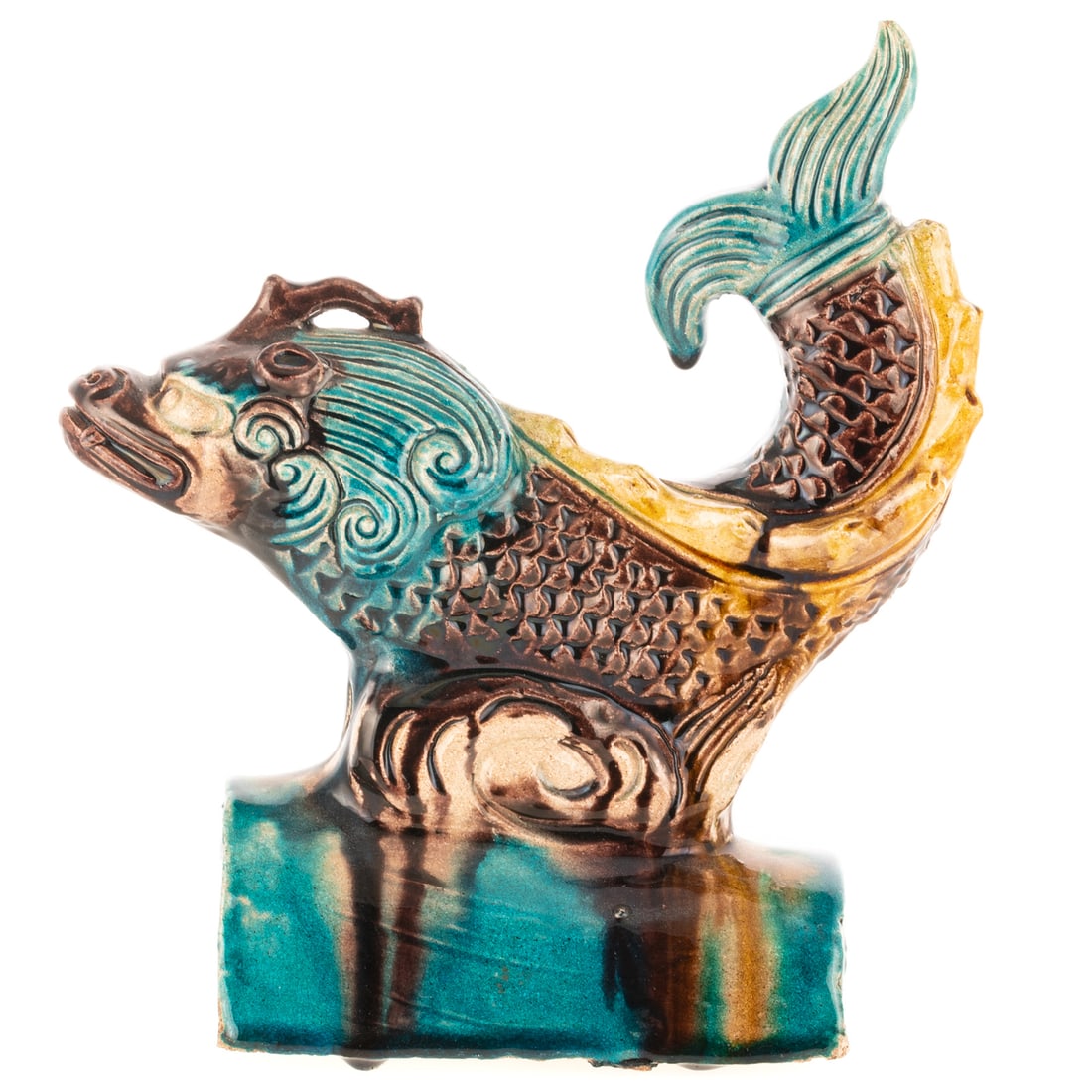 Chinese Glazed Terracotta Beast Roof Tile: PRC period, fanciful sea beast on base, 9 in. H, 8 in. L Provenance: Ex Berthe and John Ford collection, Baltimore, MD