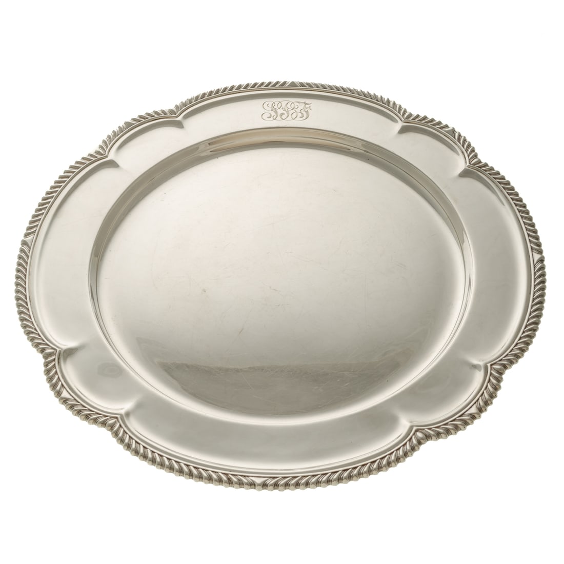 Gorham Sterling Tray: 1949 date mark, model# 13882. Circular, with applied gadrooned rim, monogrammed border, 14 1/8 in. Diam., 35.65 ozt. From the Estate of Dr. William F. Fritz, Baltimore, MD