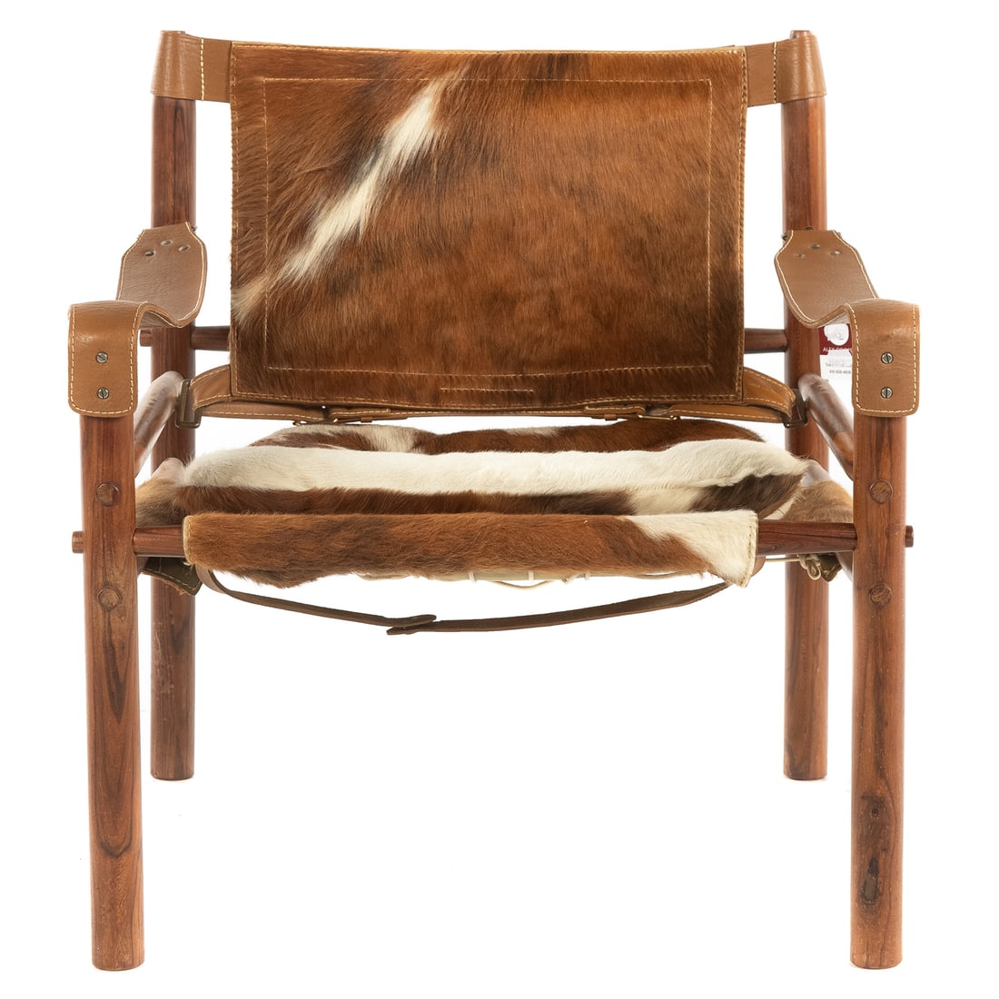 Arne Norell Wenge & Calfskin Sirocco Safari Chair: Circa 1964, Wenge wood frame having leather strap arms, calf skin upholstery, 28 in. H, 26 1/2 in. W, 24 in. D From the Estate of Nancy Cormeny, Baltimore, MD