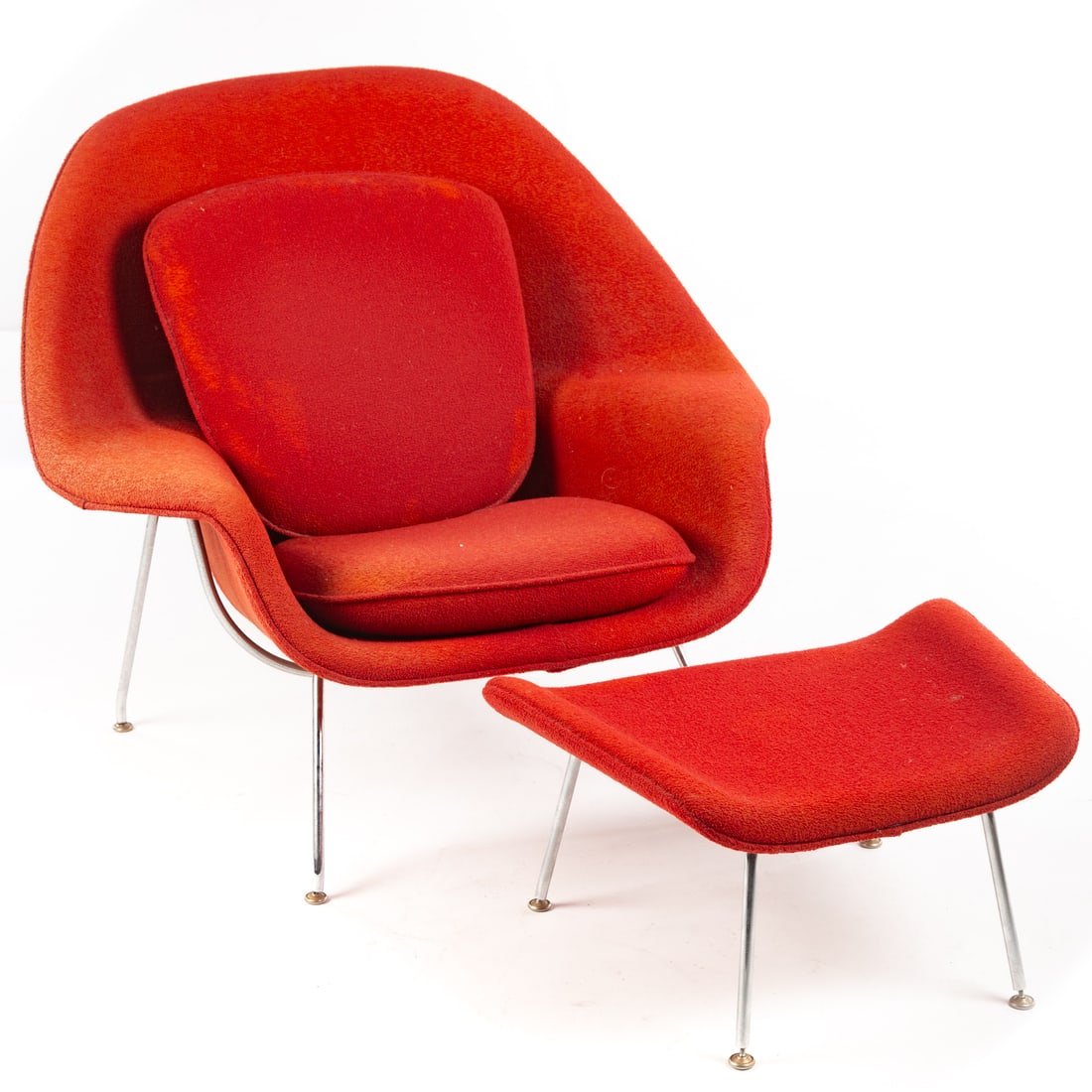 Eero Saarinen for Knoll Womb Chair & Ottoman: Circa 1950s, chrome frame with cloth covering (lacking original Knoll tag), 36 in. H, 39 in. W, 28 in. D, with matching ottoman, 13 in. H, 24 in. W, 19 in. D