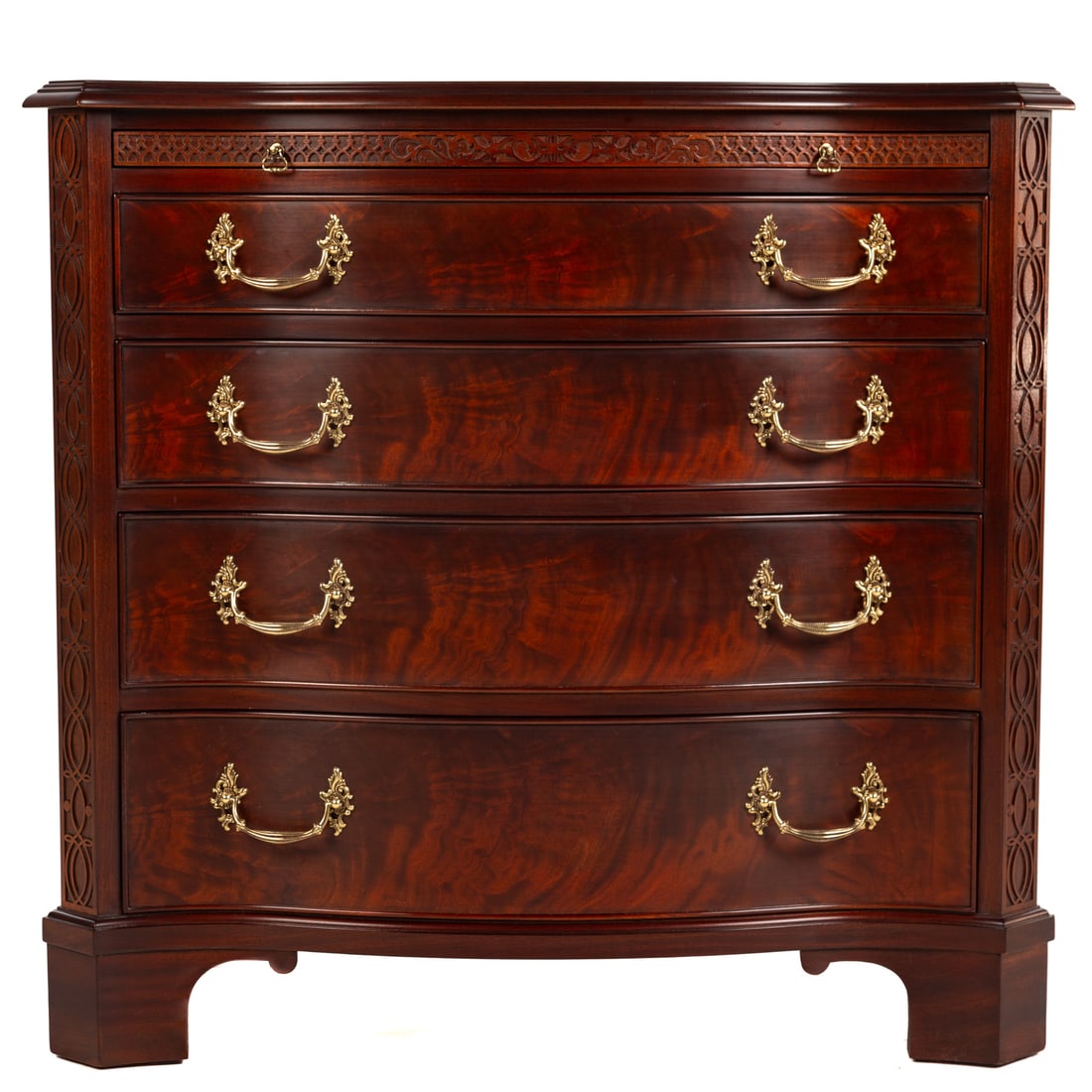 Henkel-Harris Mahogany Bachelor's Chest of Drawers: Circa 2007, in the Chippendale manner. Figured mahogany with brush slide over four graduated drawers, with fret carving on bracket feet, Henkel-Harris, Winchester, VA stamp on inside of top drawer, 34