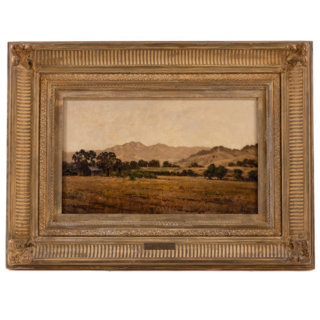 Manner of Thomas Moran. Landscape, oil: (American,1837-1926) Oil on canvas, unsigned, attribution on frame plaque, sight size: 12 x 20 1/4 in., framed size: 22 1/2 x 30 1/4 in.