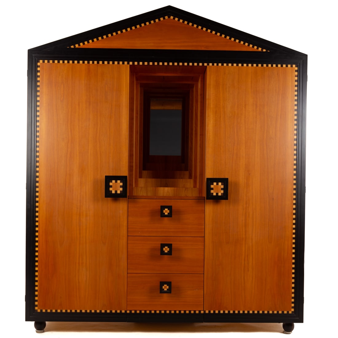 Paolo Portoghesi Cherrywood Wardrobe: For Meccani Arredamenti, mixed wood temple front form with step back center ending in dressing mirror, three drawers flanked by two cabinets, 84 in. H, 70 3/4 in. W, 26 3/4 in. D Provenance: From the