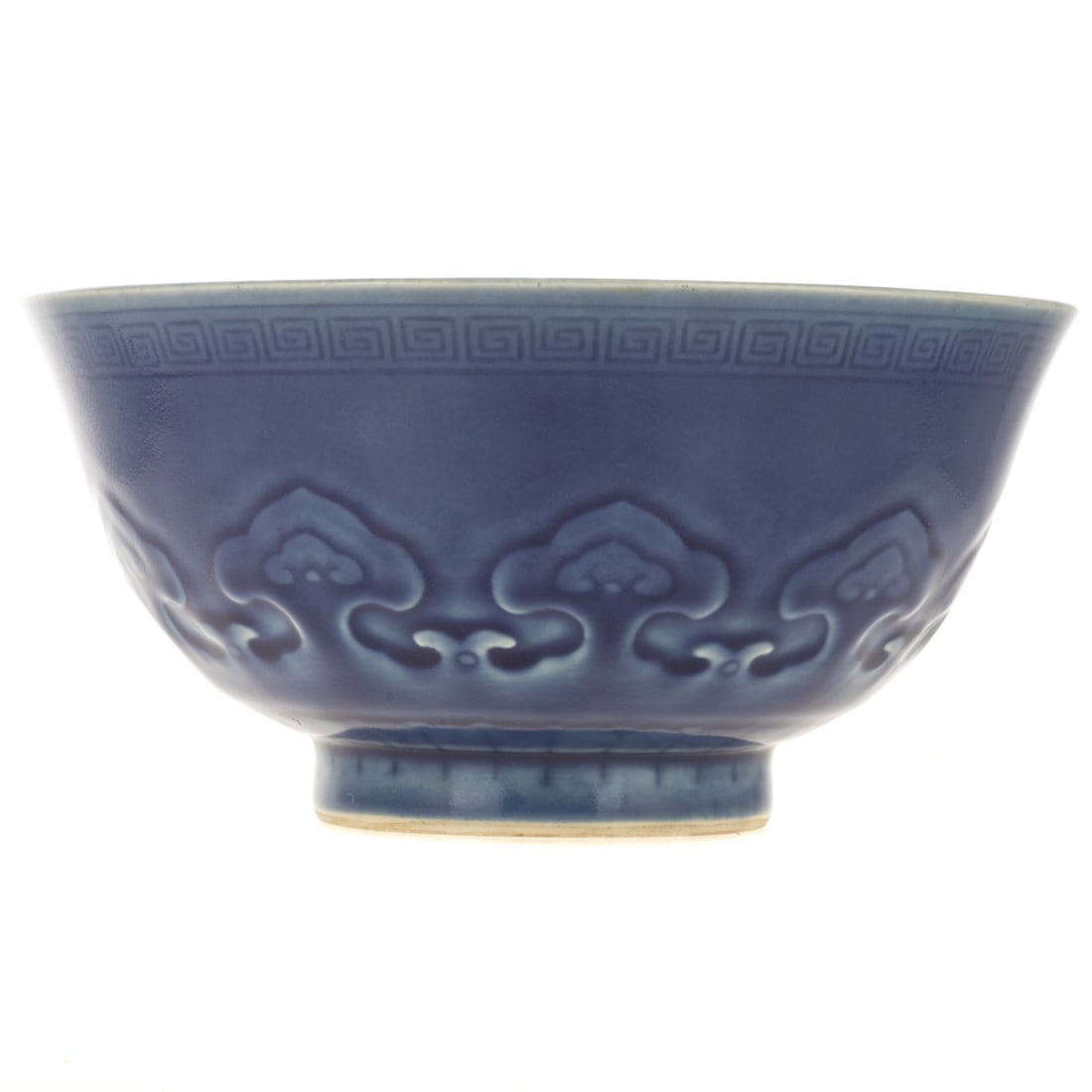A Chinese Blue Porcelain Glazed Bowl: A blue Chinese glazed porcelain bowl with flaring rim, raised on ring foot base, six-character reign mark on bottom, 4 3/4 in. H, 9 1/2 in. Diam.