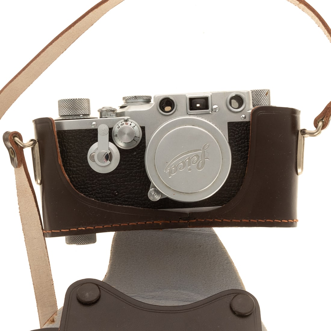 A Leica IIIc D.R.P. Ernst Leitz Wetzlar Camera: Circa 1946/47, serial#426007, Leica with Summitar f=5cm 1:2 No625456 lense and leather carrying case, stamped "Germany"