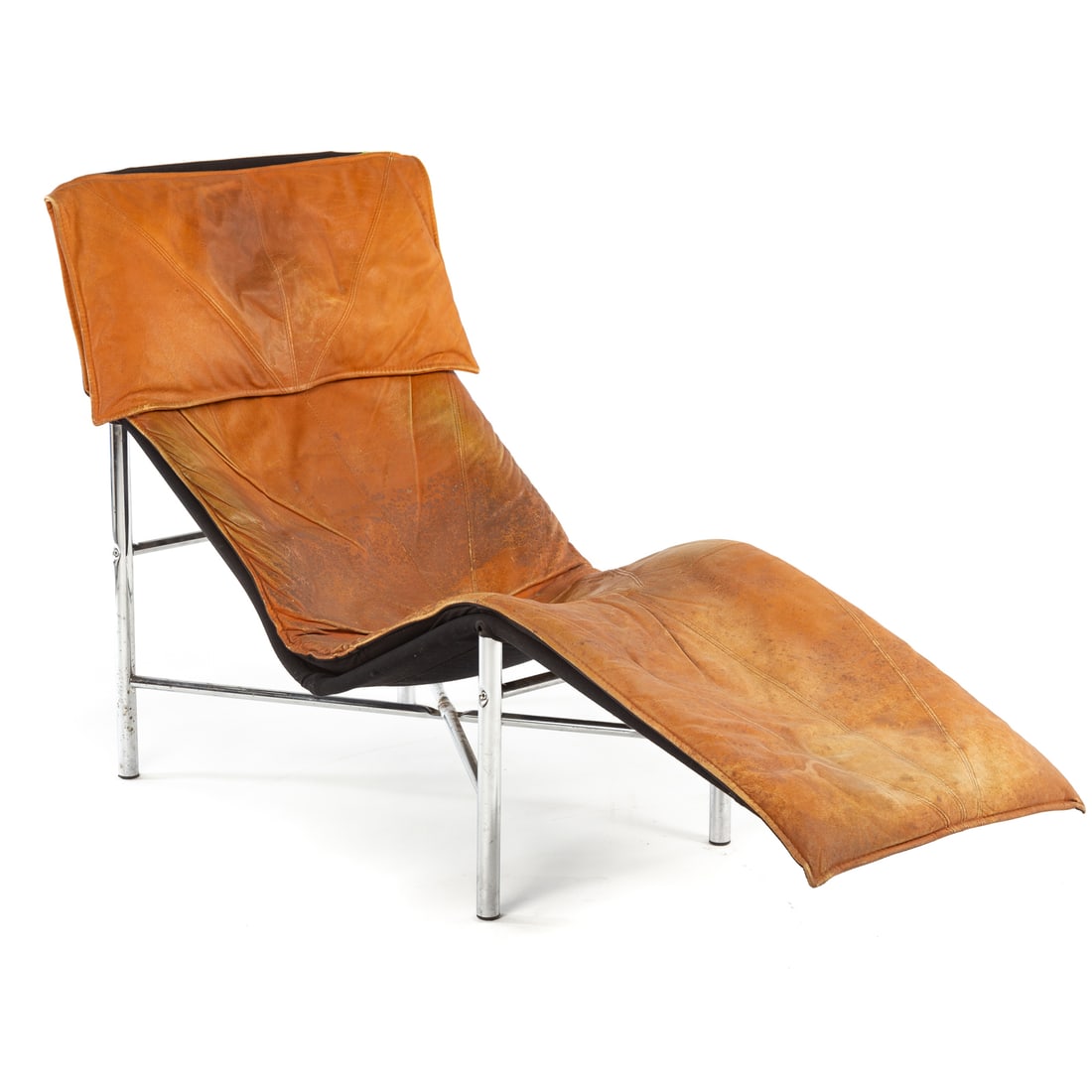 Tord Bjorklund "Skye" Danish Modern Chaise Lounge: 20th century, distressed leather cushion over chrome frame, 37 in. H, 57 1/2 in. L, 28 in. W