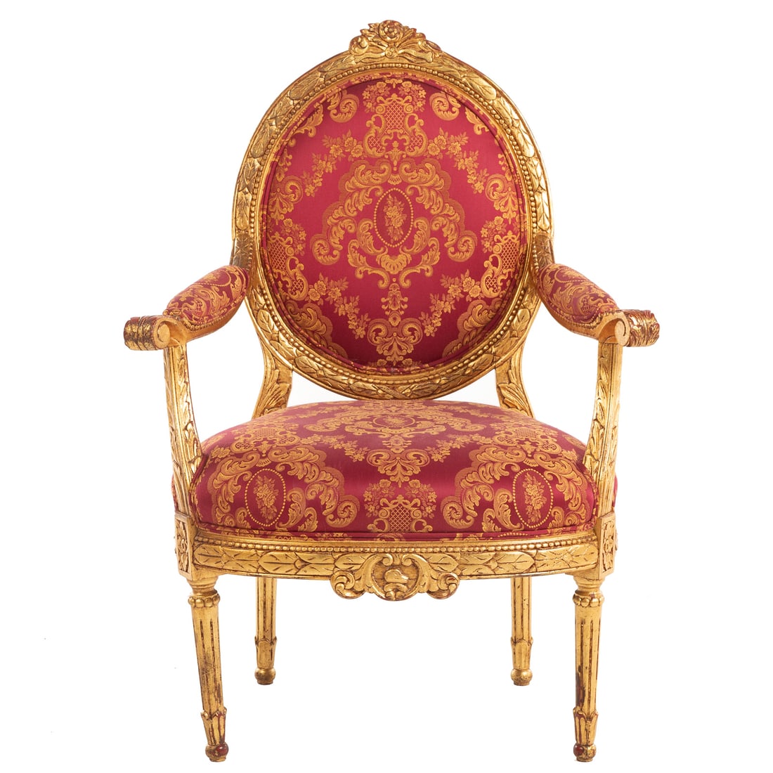 Louis XVI Giltwood Armchair: Carved and distressed giltwood frame with upholstered arms ending in scroll form knuckles, turned and fluted legs, 39 1/2 in. H, 28 in. W, 16 in. D