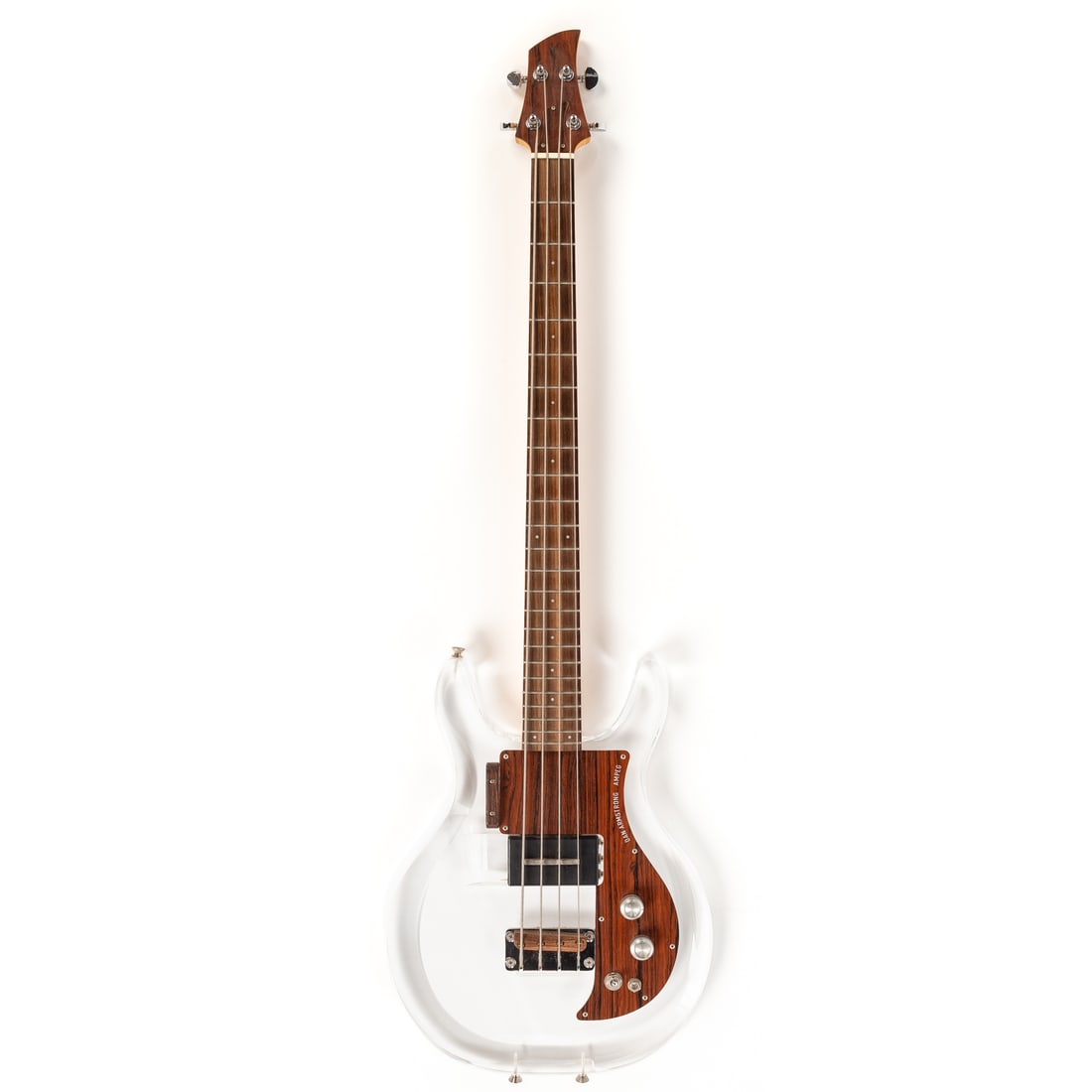 Ampeg Dan Armstrong ADA4 Lucite Bass Guitar: Serial # DA08090085, 2008 reissue, body is transparent acrylic, maple neck, rosewood fretboard, includes original hard shell case, and an alternate pickup; electronics have been tested, and are functi
