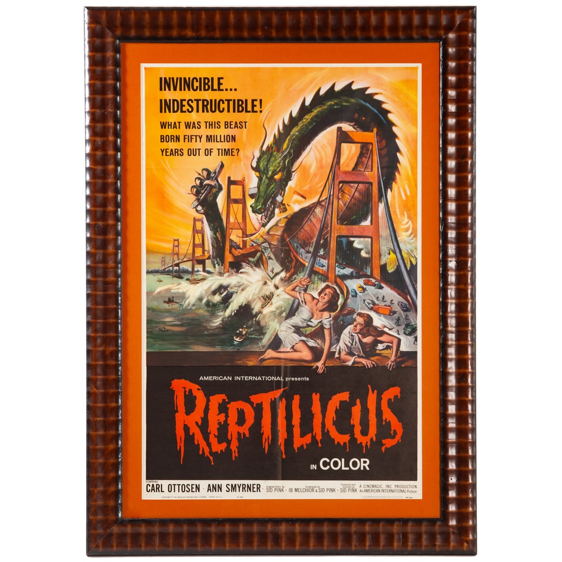 "Reptilicus," vintage movie poster: (American International) Color movie poster, 1962, ed. 62/415, artwork by Reynold Brown, sight size: 39 x 24 3/4 in., framed size: 49 1/2 x 36 in. Provenance: From the collection of Leigh and Lois Abt