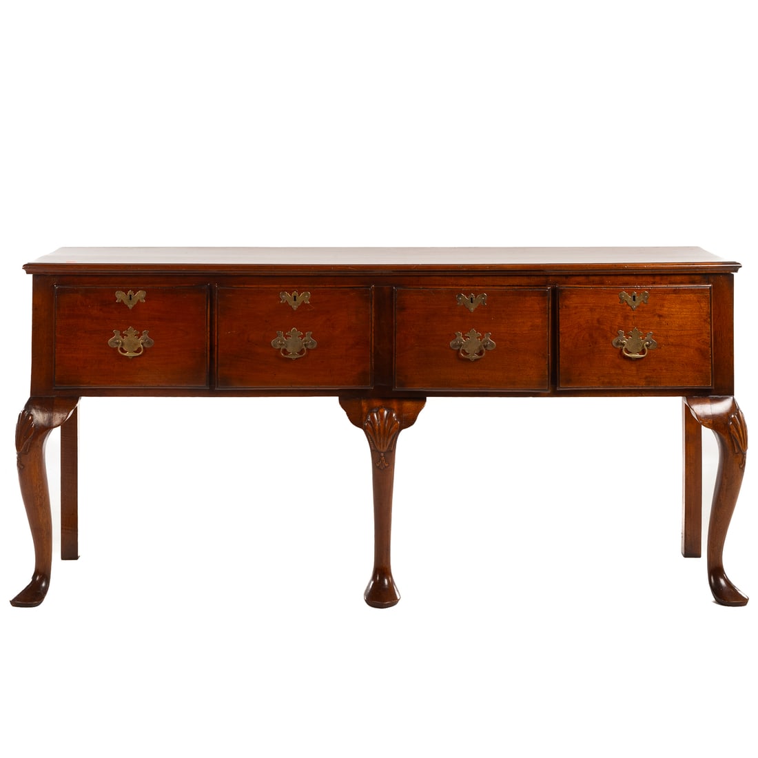 George II Style Mahogany Sideboard: Late 19th /early 20th century, molded top over four deep drawers, supported by front cabriole legs with shell carved knees and pad feet, 33 in. H, 71 in. W, 18 1/4 in. D