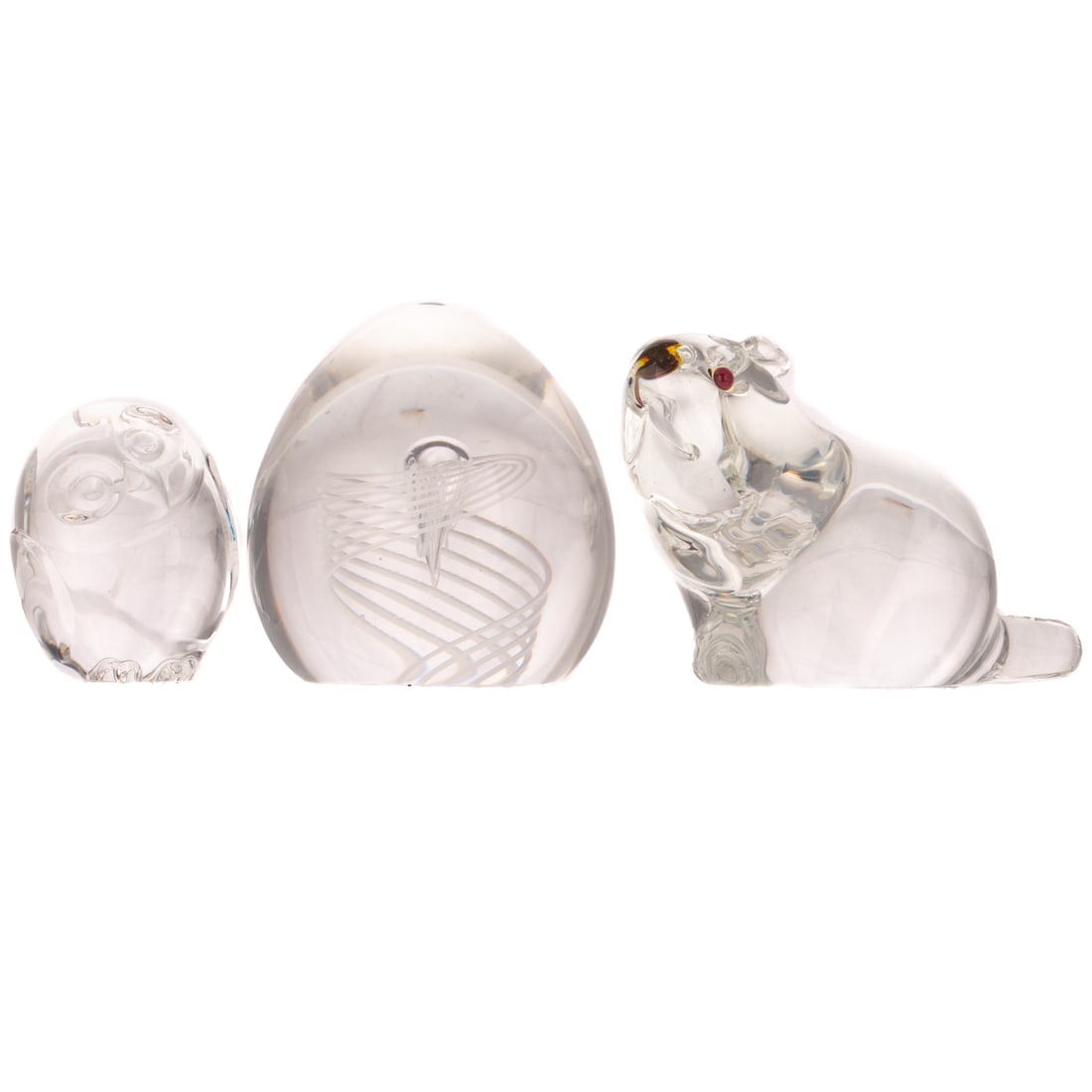 Three Steuben Table Items: Includes a colorless Steuben beaver, incised "Steuben" signature on bottom, 3 in. H, approx. 5 1/2 in. L, 2 1/2 in. D; a colorless Steuben owl, incised "Steuben" signature on bottom, approx. 2 1/2 in.