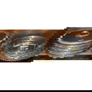 A Set of Four & Four Other Lincoln Hubcaps: The largest is 17 in. Diam.
