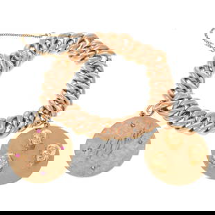 A Pair of Oscar Caplan Charms on Rose Gold Bracelet in 14K: 1908 - 1927, Russian 14K rose gold bracelet featuring large curb links, 12.8 mm W, hidden box clasp and safety chain, affixed with two 14K yellow gold charms by Oscar Caplan, Baltimore, MD, one