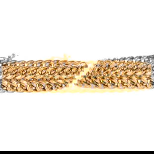 A Double Cuban Link Chain Bracelet in 14K: 14K yellow gold Italian bracelet with two rows of Cuban links stacked on top of each other, box clasp with safety latch, 7 in. L, 19.2 grams