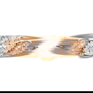 A The Leo Diamond Ring & Wrap in 14K: 14K yellow gold ring featuring a prong set round The Leo diamond weighing approx. 0.50 ct with an average color grade of G - H and an average clarity grade of SI soldered to a wrap featuring two