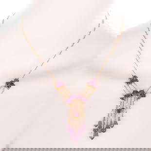 An Amethyst & Seed Pearl Bib Necklace in 14K: Vintage 14K yellow gold bib necklace featuring trios of round amethyst above a triple strand of cable links suspending an arch of four round amethyst and a seed pearl from which five tassels with amet