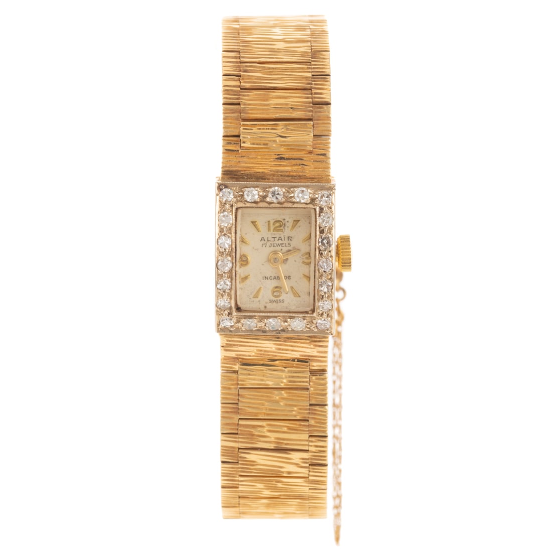 A Diamond & Gold Altair Wrist Watch in 14K: 14K yellow gold Incabloc wristwatch by Altair, Switzerland, rectangular white dial with gilt Arabic numerals and dagger indices, dome crystal with diamond bezel weighing approx. 0.40 ctw, mechanical m
