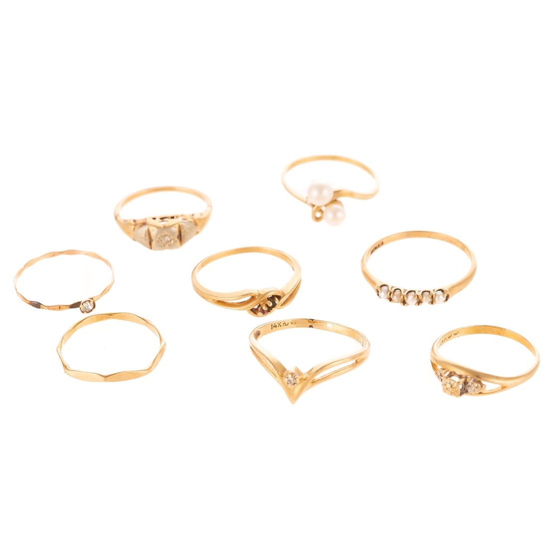 A Collection of Diamond & Pearl Rings in 14K: Eight 14K yellow gold vintage rings featuring diamonds and pearls in unique designs, sizes range from 5.25 to 8, 10.1 grams tw